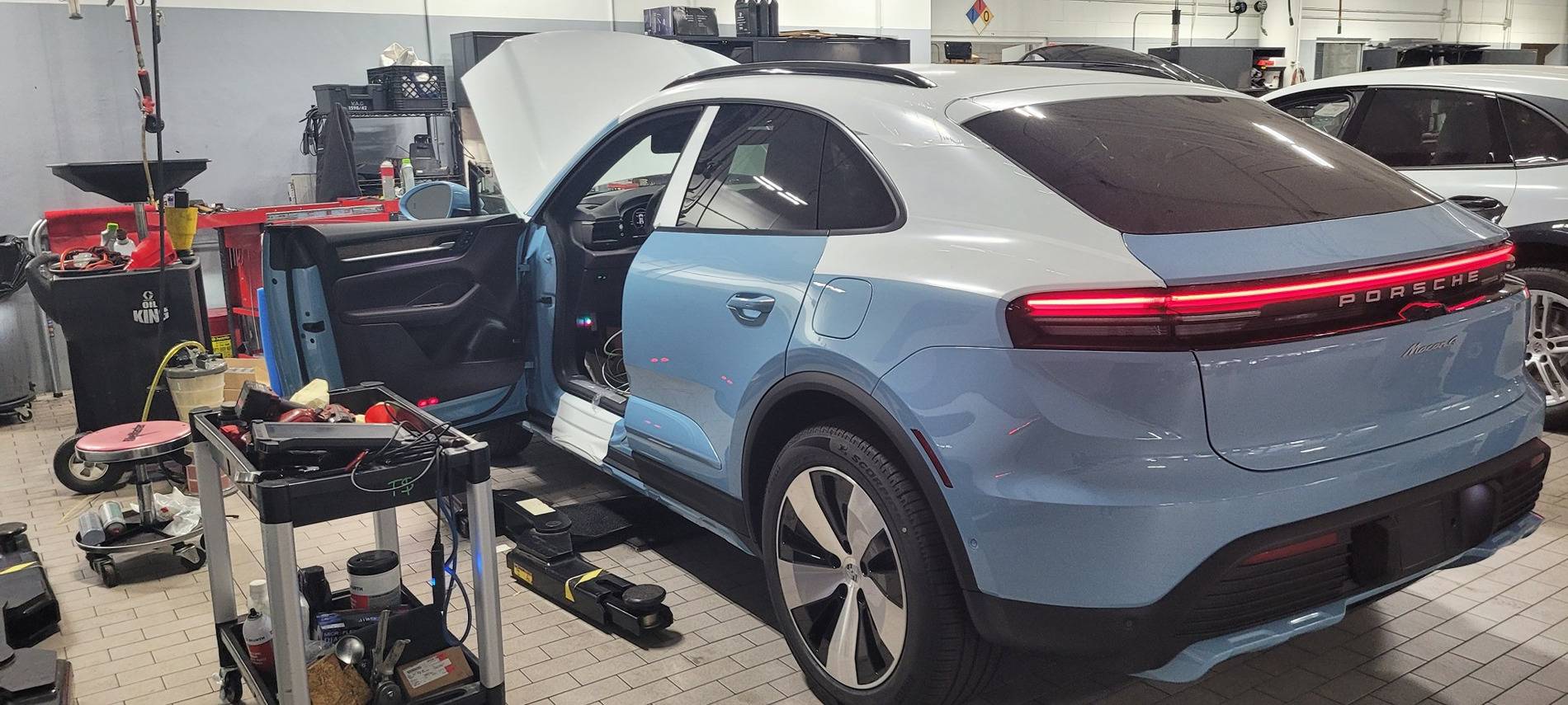 Electric Macan EV First pictures from dealer - Macan 4 EV in Frozen Blue / Blackburry interior 3699135566460774916