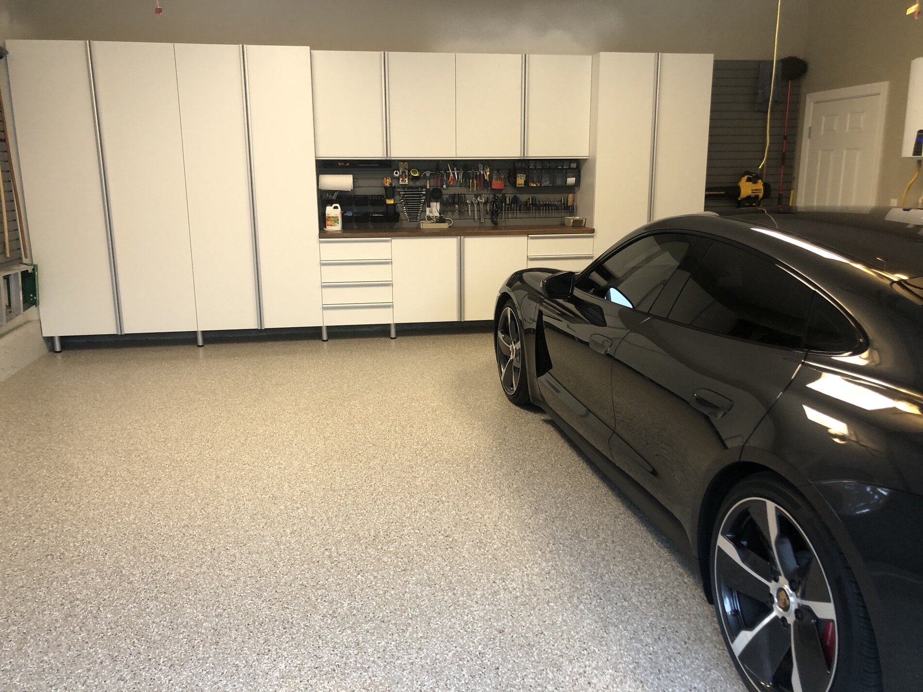 Electric Macan EV Garage Floor Coatings FD309AD1-FDCD-4B4F-8ED2-1C96C6896CC6