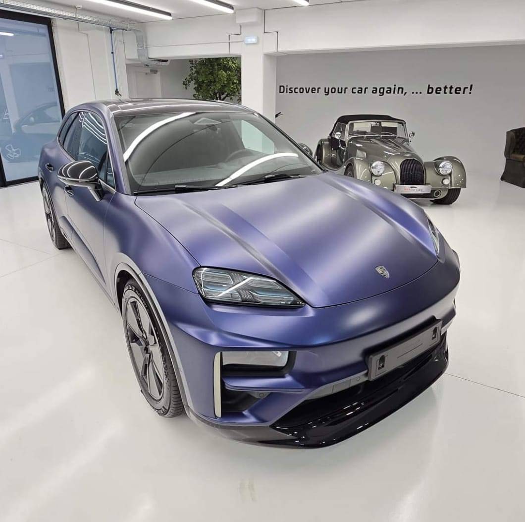 Electric Macan EV GENTIAN BLUE Macan EV Photos Gentian Blue w: XPEL Stealth Wrap, gloss black door handles, 20%22 OEM wheels blacked out 5