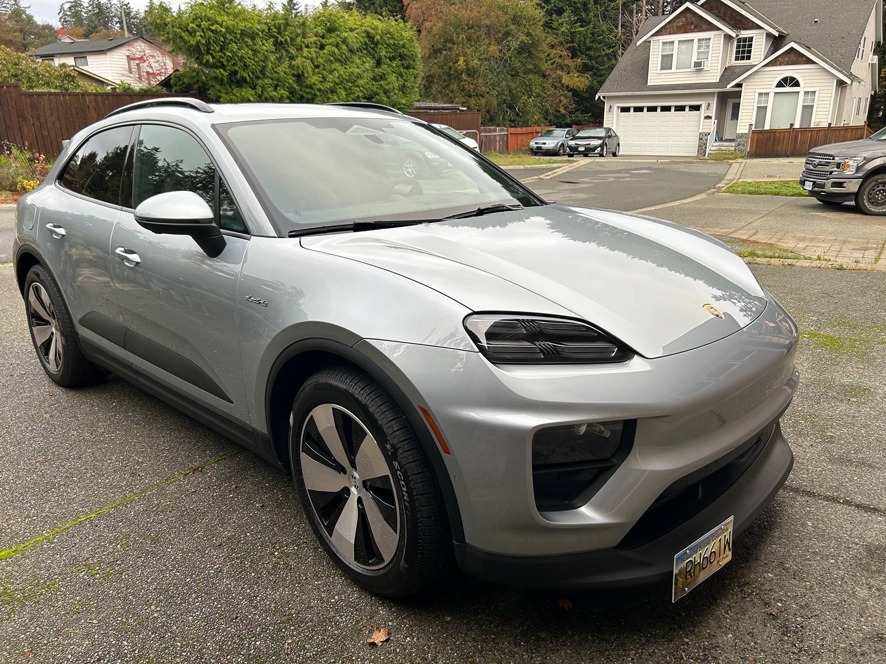 Electric Macan EV Jet Black Macan Turbo EV with Glacier Blue LED Headlight Accents & Glacier Blue Glacier Blue Rear Tail Light Logo IMG_5738