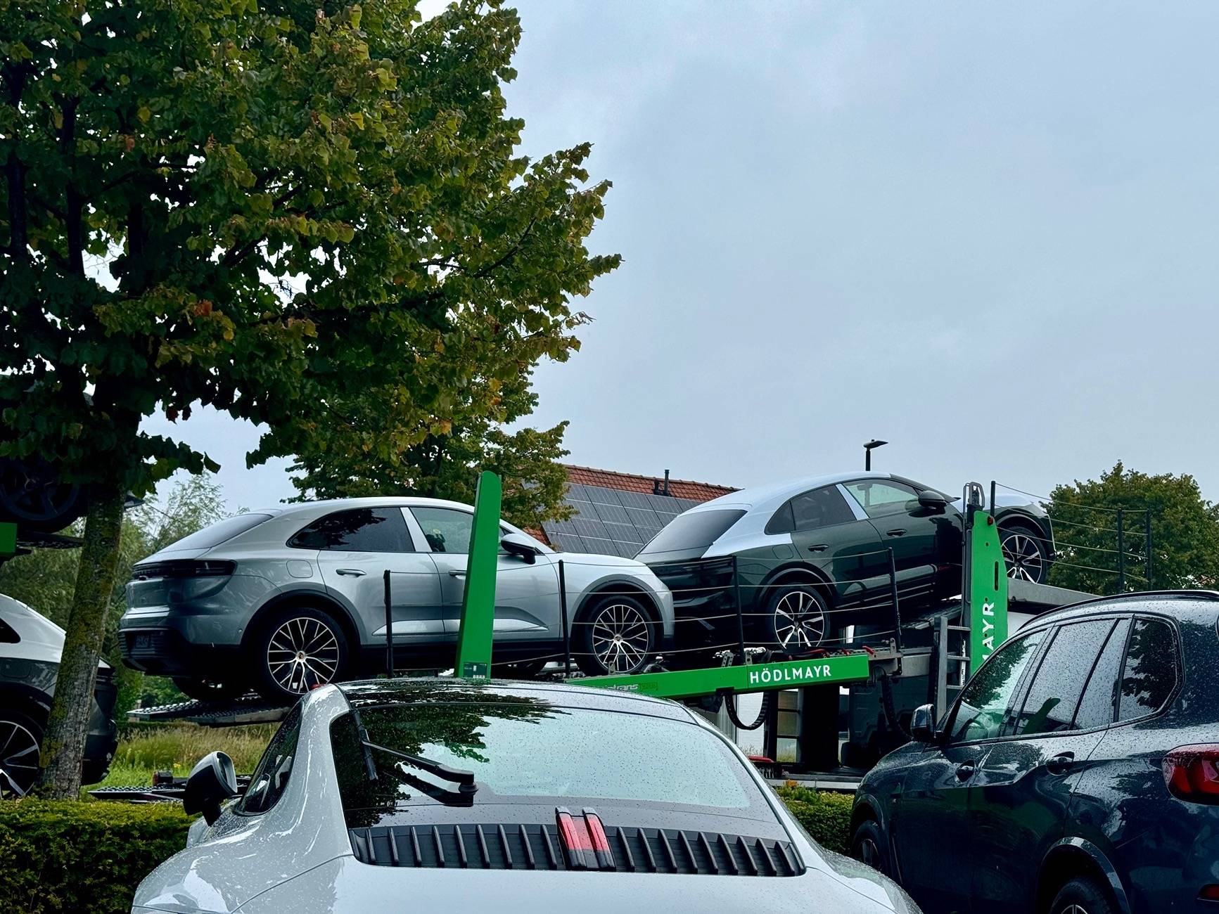 Macan EV New Macan 4 and Turbo EV delivery to local dealer (photos) IMG_5936