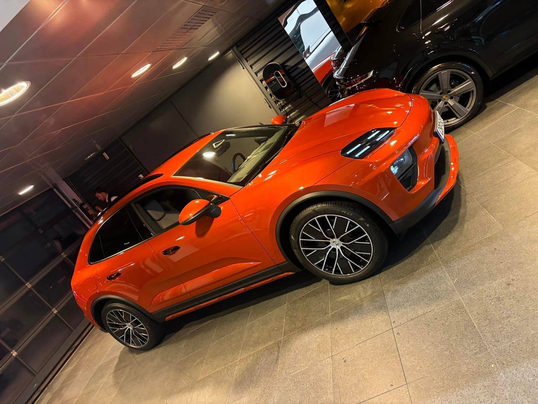 Electric Macan EV Papaya Macan EV w/ Offroad Package, Painted Side Blades, Partial Debadged (Macan & Electric Letters) Papaya Macan EV Offroad Package 1