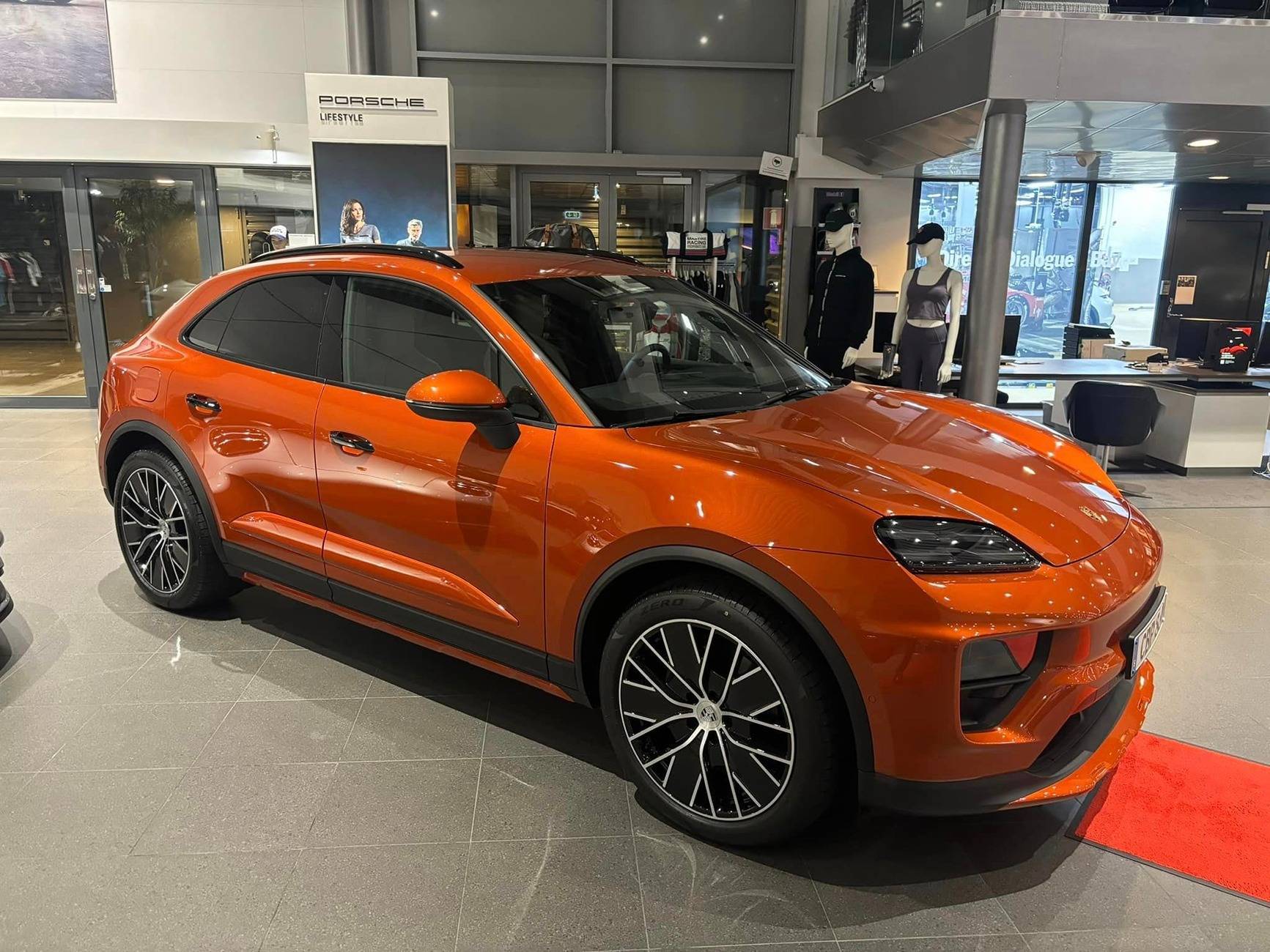 Electric Macan EV Papaya Macan EV w/ Offroad Package, Painted Side Blades, Partial Debadged (Macan & Electric Letters) Papaya Macan EV Offroad Package 2