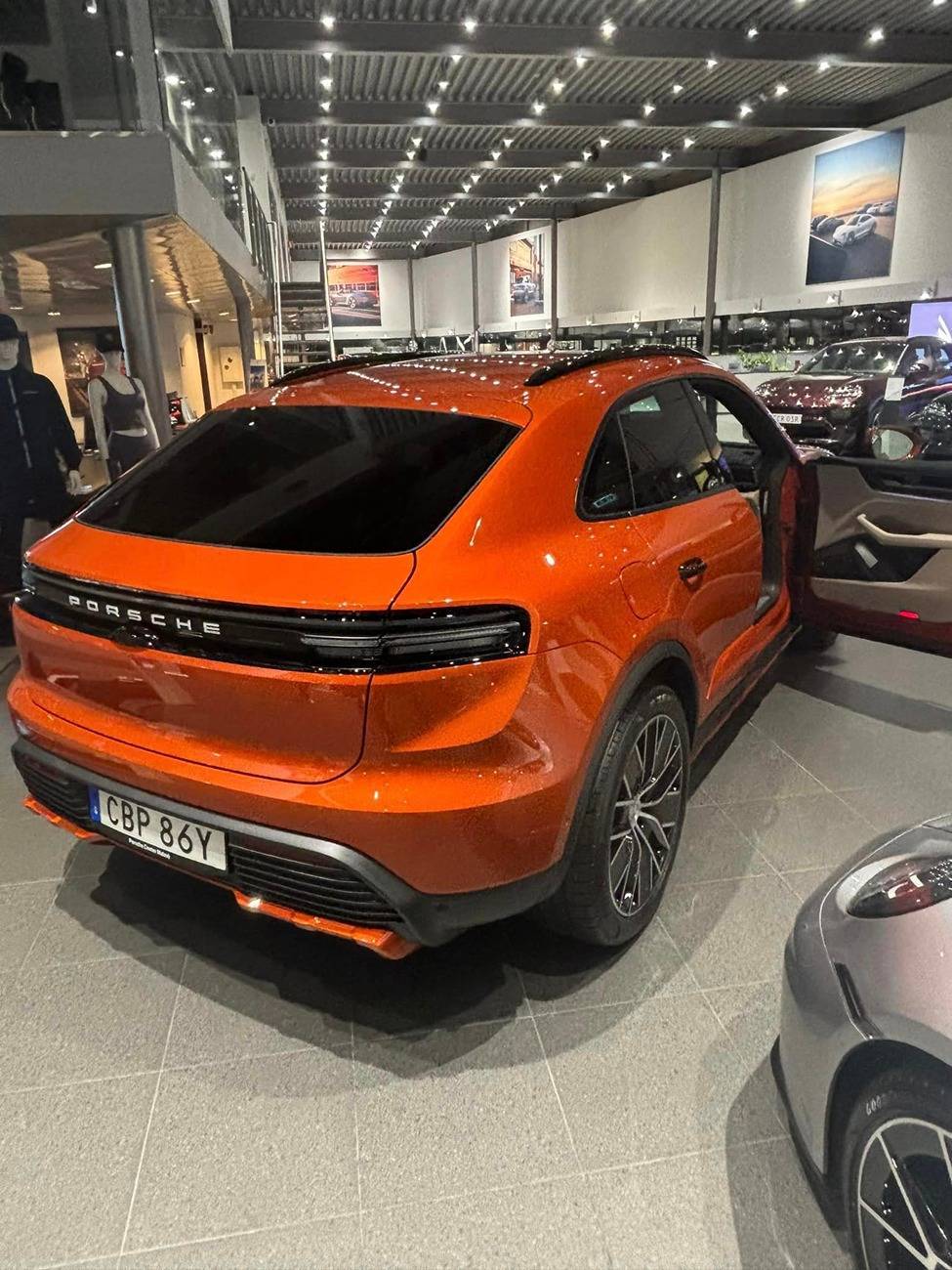 Electric Macan EV Papaya Macan EV w/ Offroad Package, Painted Side Blades, Partial Debadged (Macan & Electric Letters) Papaya Macan EV Offroad Package 3