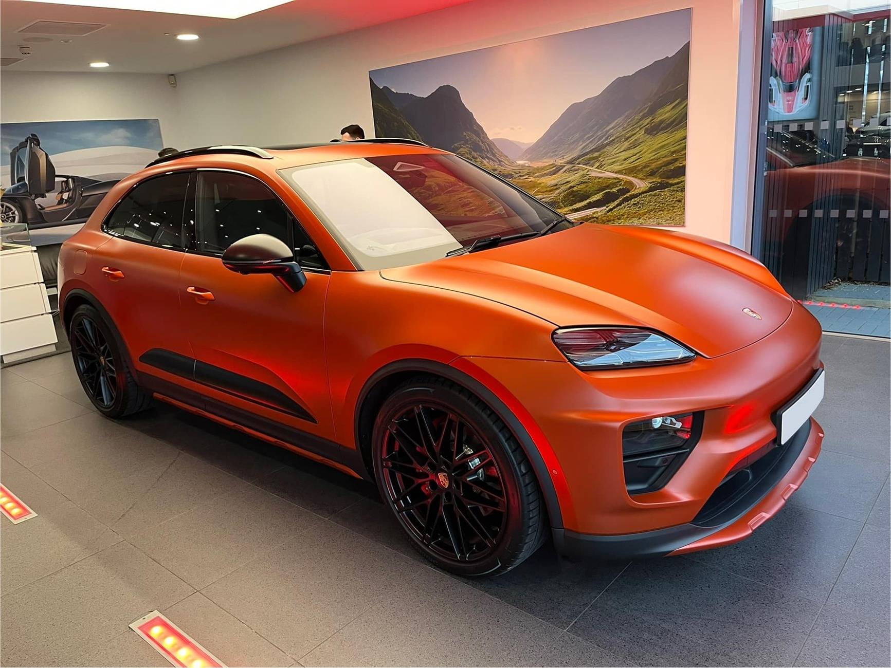 Electric Macan EV Stealth satin PPF film wrap on Papaya Orange Macan EV looks amazing! Stealth satin PPF film wrap on Papaya Orange Macan EV