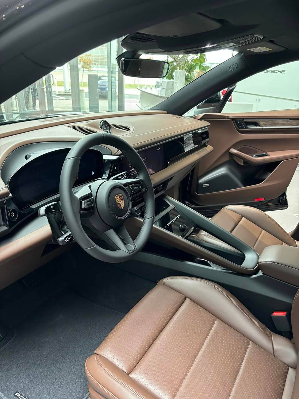 Macan EV JET BLACK METALLIC Macan EV Photos Thread truffle brown interior macan ev electric 1