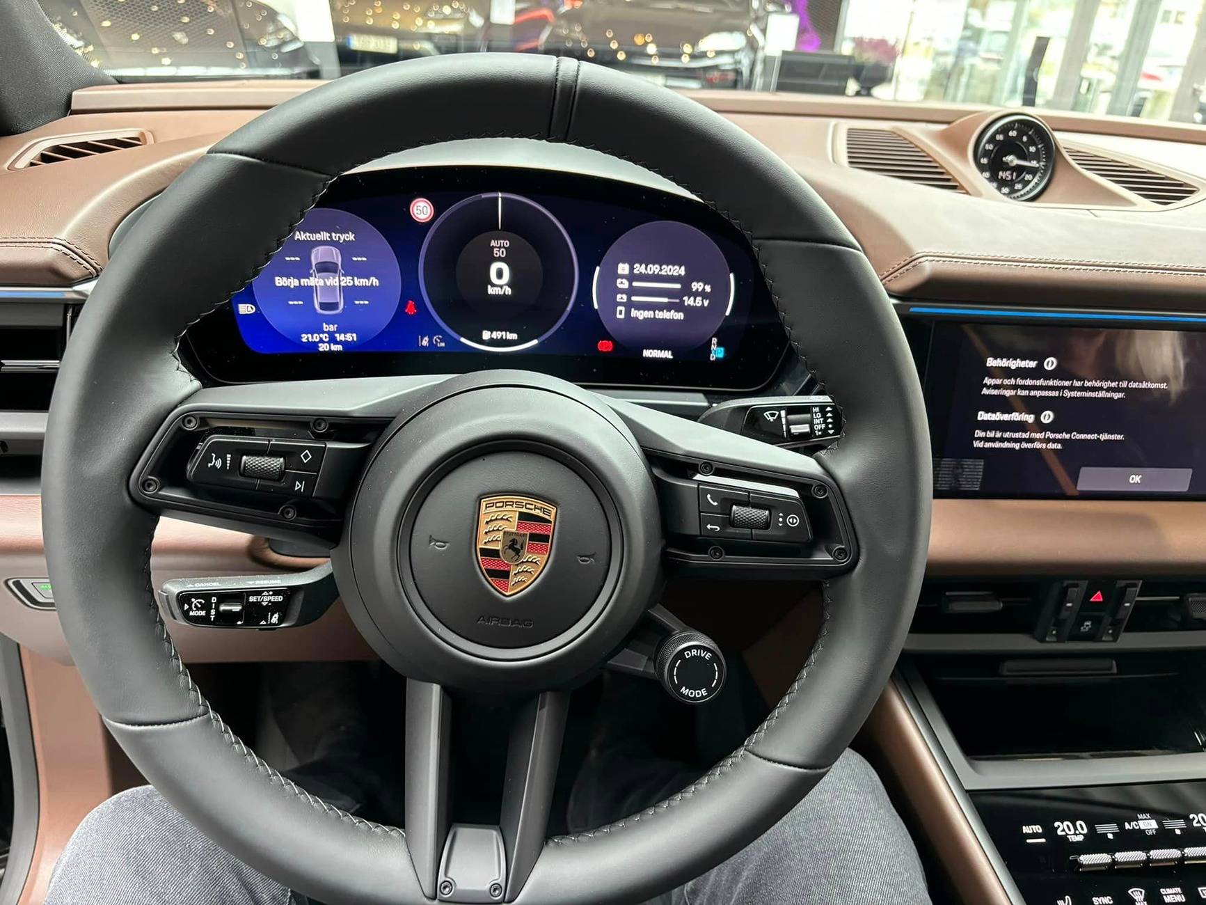 Macan EV JET BLACK METALLIC Macan EV Photos Thread truffle brown interior macan ev electric 2